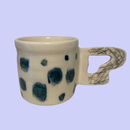 Tasse à pois